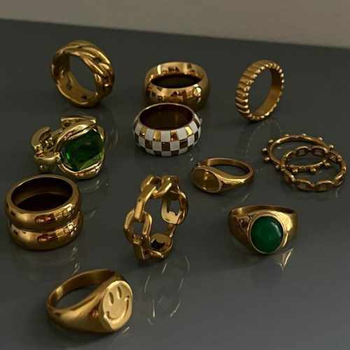 A collection of Gold Rings on a table