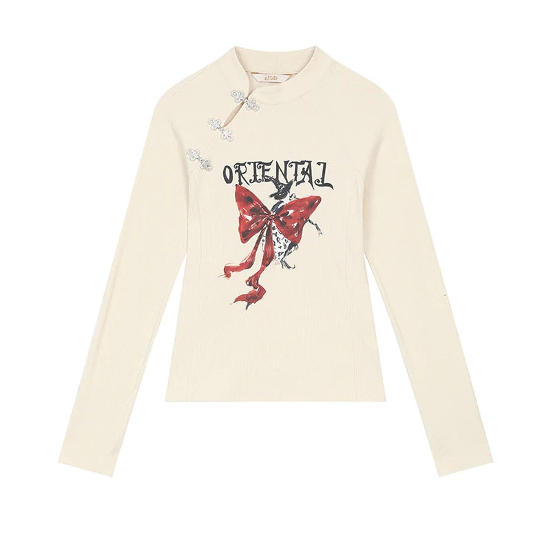 ELFSACK 2025 Winter New Arrivals Y2K Chinese Style Irregular Button Collar Bow Graphic Long Sleeve Tshirt For Women